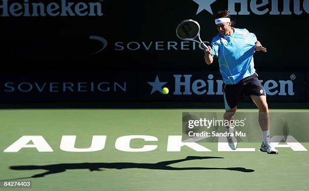 David Ferrer of Spain plays a forehand in his second round match against Marc Gicquel of France during day three of the Heineken Open at ASB Tennis...