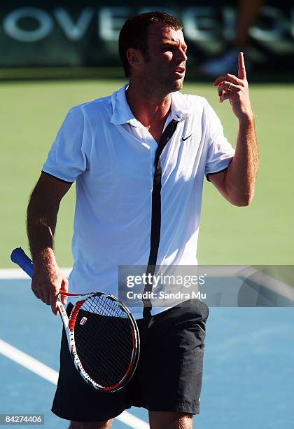 Marc Gicquel of France questions the umpire in his second round match against David Ferrer of Spain during day three of the Heineken Open at ASB...