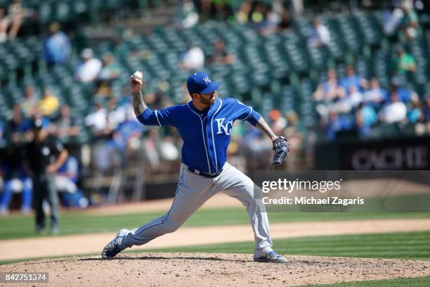 Peter Moylan of the Kansas City Royals pitches during the game against the Oakland Athletics at the Oakland Alameda Coliseum on August 16, 2017 in...