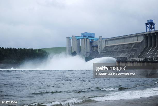This photo taken on September 3, 2017 shows floodwater being discharged from a dam at Danjiangkou reservoir in the middle route of the South-to-North...