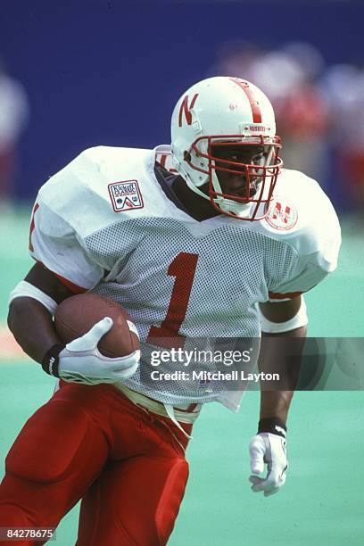 Lawrence Phillips of the Nebraska Cornhuskers runs with the ball during a college football game against the West Virginia Mountaineers on August 31,...