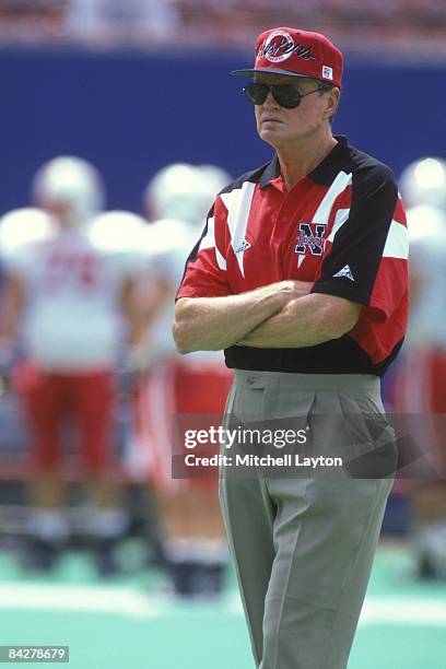 Tom Osbourne, head coach of the Nebraska Cornhuskers, before a college football game against the West Virginia Mountaineers on August 31, 1994 at...