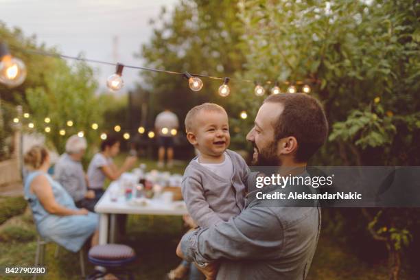 our celebration party - multi generation family outside stock pictures, royalty-free photos & images