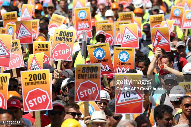 Workers of the construction and public works sector demonstrate on September 5, 2017 in Saint-Denis de la Reunion, on the French overseas island of...