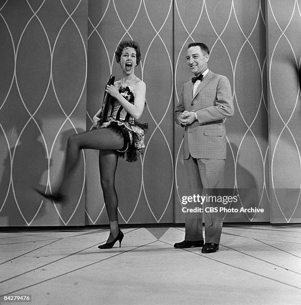 American commedienne Carol Burnett and television show host Garry Moore perform together on an episode of 'The Garry Moore Show,' New York, New York,...