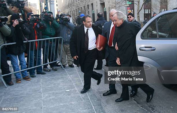 Accused $50 billion swindler Bernard Madoff enters federal court January 14, 2009 in New York City. U.S. Prosecutors want to end his house arrest at...