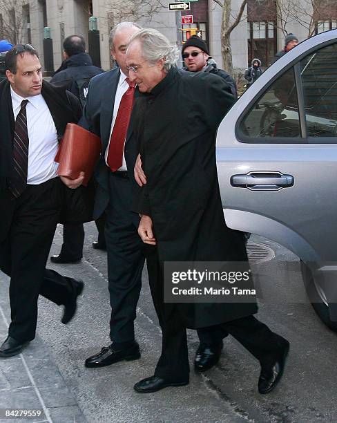 Accused $50 billion swindler Bernard Madoff enters Federal court January 14, 2009 in New York City. U.S. Prosecutors want to end his house arrest at...