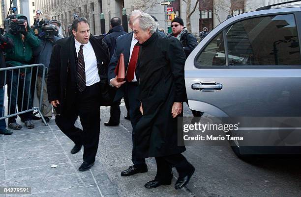 Accused $50 billion swindler Bernard Madoff enters Federal court January 14, 2009 in New York City. U.S. Prosecutors want to end his house arrest at...