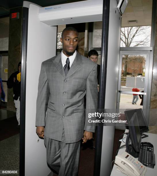 New York Giants wide receiver Plaxico Burress walks through security as he arrives at the Lebanon County Courthouse January 14, 2009 in Lebanon, Pa....