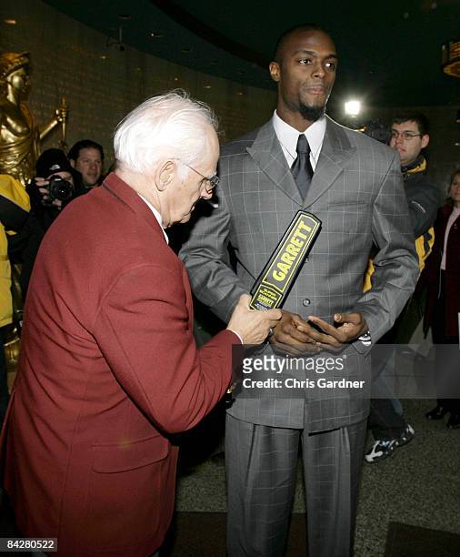New York Giants wide receiver Plaxico Burress is checked by security personnel as he arrives at the Lebanon County Courthouse January 14, 2009 in...