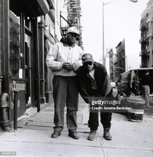 East coast hip hop group Gang Starr poses on a New York City street, 1991. On the left is Christopher Edward Martin aka DJ Premier, while next to him...