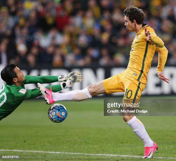 Goalkeeper Sinthaweechai Hathairattanakool of Thailand saves a goal attempt by Robbie Kruse of the Socceroos during the 2018 FIFA World Cup Qualifier...
