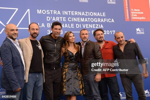 Ivan Cappiello, Alessandro Rak, Alessandro Gassmann, Maria Pia Calzone, Massimiliano Gallo, Marino Guarnieri and Dario Sansone, attend the photocall...