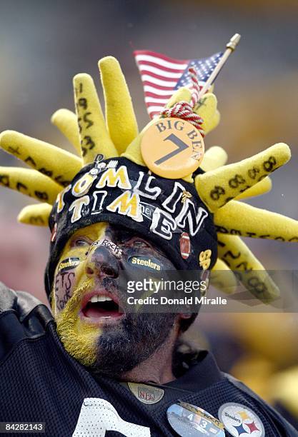 Male fans of the Pittsburgh Steelers cheers for his team during the Steeler's 35-24 win over the San Diego Chargers in the NFL AFC Playoff Card Game...
