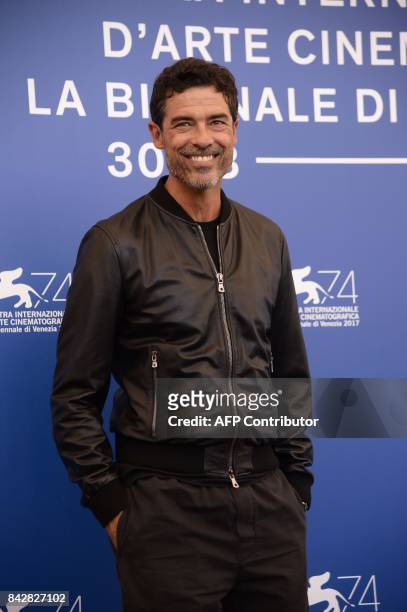 Italian actor Alessandro Gassmann attends the photocall of the movie "Gatta Cenerentola" presented in the "Orizzonti" selection at the 74th Venice...