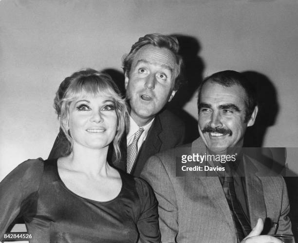 From left to right, actors Diane Cilento, Robert Hardy and Sean Connery at a press reception at the Mayfair Hotel in London, to announce their...