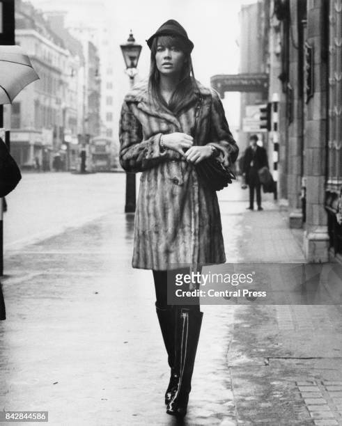 French singer Françoise Hardy walks down The Strand in London, 5th November 1966.