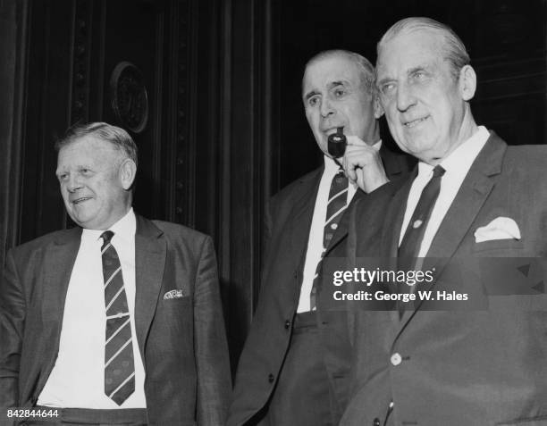 From left to right, Alan Hardaker, Len Shipman and Mr Bolton, the Secretary, President and Vice-President of the Football League respectively, arrive...