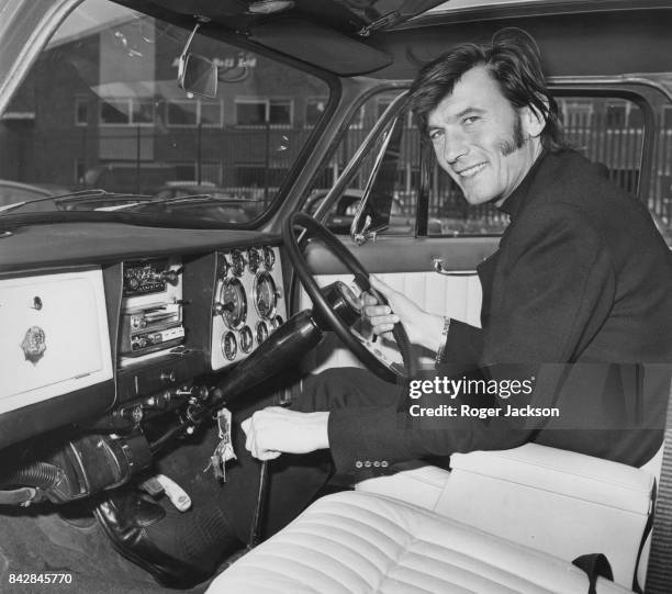 Lithuanian-born actor Laurence Harvey at the wheel of his brand new Wood & Pickett Margrave Mini Cooper S, completed to his specifications, UK, 15th...