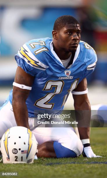 Running back LaDainian Tomlinson of the San Diego Chargers stretches on the field before the start against the Indianapolis Colts during the Chargers...