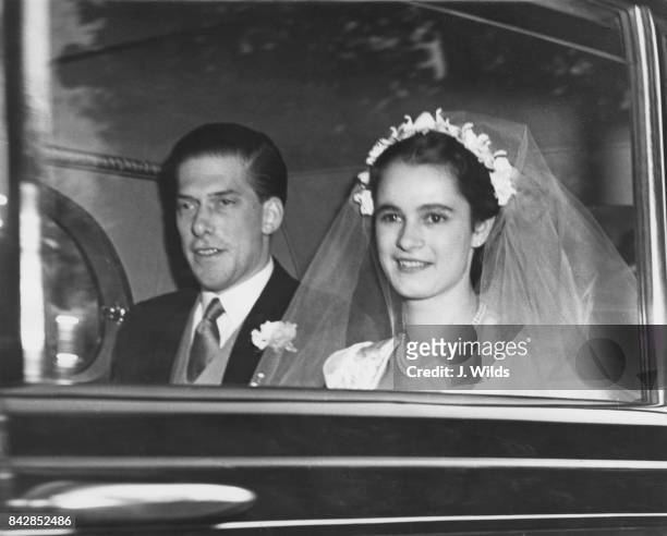 The 7th Earl of Harewood and pianist Marion Stein, now the Countess of Harewood arrive at St James' Palace in London for their wedding reception,...