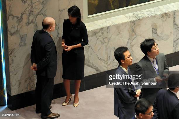 Ambassador to the U.N. Nikki Haley speaks on the sidelines with Chinese Ambassador Liu Jieyi during a United Nations Security Council meeting on...