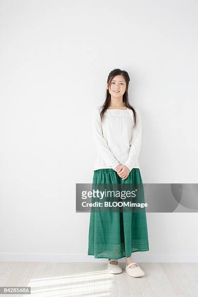 portrait of woman - skirt stock pictures, royalty-free photos & images