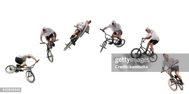 young bmx fiets rider op wit – geïsoleerd met uitknippad - crossfietsen stockfoto's en -beelden
