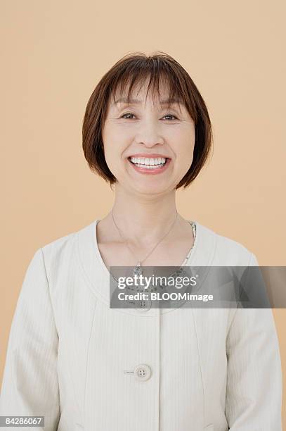 mature woman, portrait, close-up, studio shot - portrait close up loosely stock pictures, royalty-free photos & images