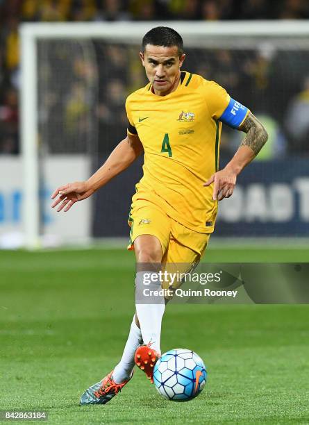 Tim Cahill of Australia looks to pass the ball during the 2018 FIFA World Cup Qualifier match between the Australian Socceroos and Thailand at AAMI...