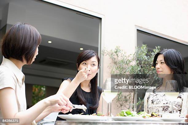 woman having meals - only japanese stock pictures, royalty-free photos & images