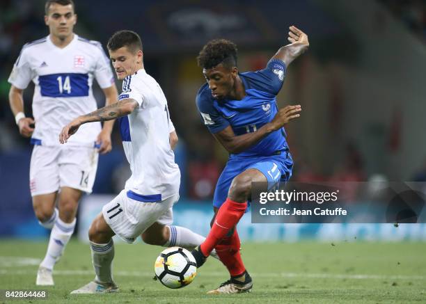Kingsley Coman of France, Olivier Thill of Luxembourg during the FIFA 2018 World Cup Qualifier between France and Luxembourg at the Stadium on...