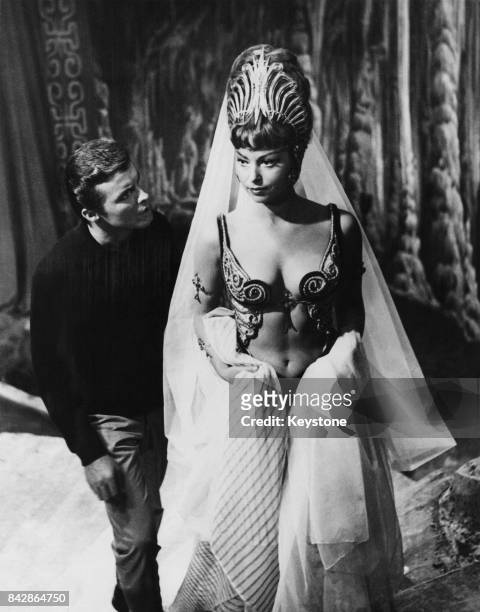 Israeli actress Haya Harareet and actor Rad Fulton on the set of the film 'Antinea' (later titled 'Journey Beneath the Desert', in Rome, Italy, 24th...