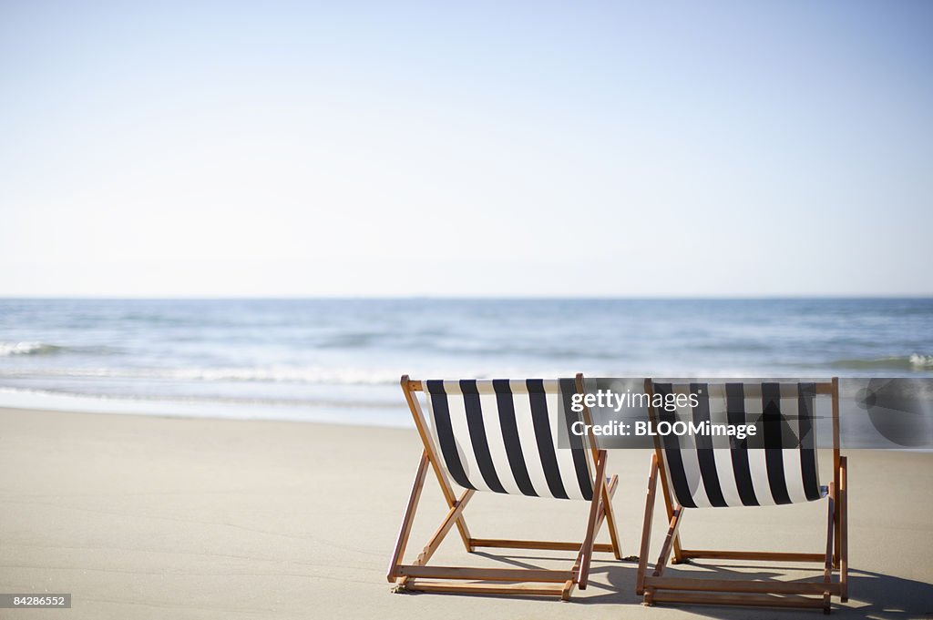 Deck chairs on beach