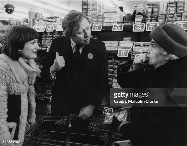 Tessa Jowell , the Labour Party candidate for Ilford North, and Roy Hattersley, the Secretary of State for Prices and Consumer Protection, talk to...