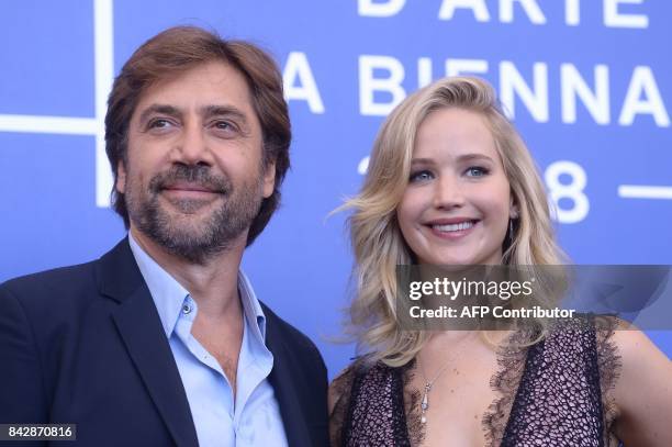Spanish actor Javier Bardem and US actress Jennifer Lawrence attend the photocall of the movie "Mother" presented in competition at the 74th Venice...