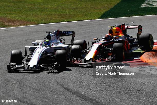 Felipe Massa of Brazil driving the Williams Martini Racing Williams FW40 Mercedes and Max Verstappen of the Netherlands driving the Red Bull Racing...