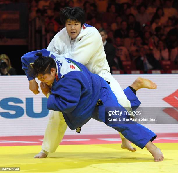 Sarah Asahina of Japan and Yu Song of China compete in the Women's +78kg final during day six of the World Judo Championships at the Laszlo Papp...