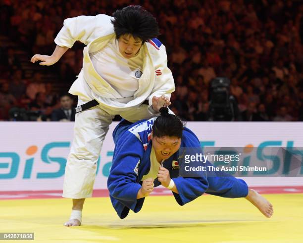 Sarah Asahina of Japan and Yu Song of China compete in the Women's +78kg final during day six of the World Judo Championships at the Laszlo Papp...