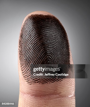 Fingerprint ink on finger Fingerprint ink on finger
