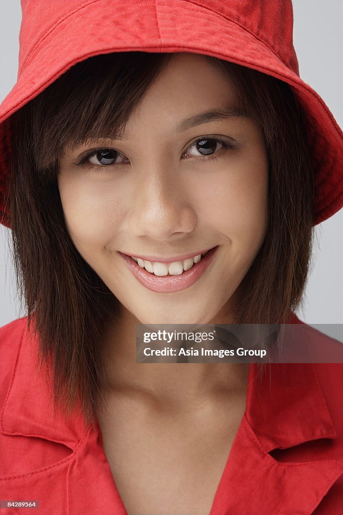 Young woman in red hat