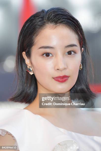 Suzu Hirose walks the red carpet ahead of the 'The Third Murder ' screening during the 74th Venice Film Festival at Sala Grande on September 5, 2017...
