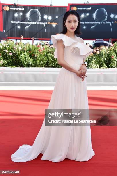 Suzu Hirose walks the red carpet ahead of the 'The Third Murder ' screening during the 74th Venice Film Festival at Sala Grande on September 5, 2017...