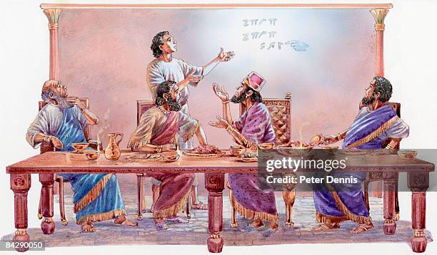 illustration of daniel interpreting writing on wall for babylonian king belshazzar and nobles sitting at table during banquet - babylonia stock illustrations