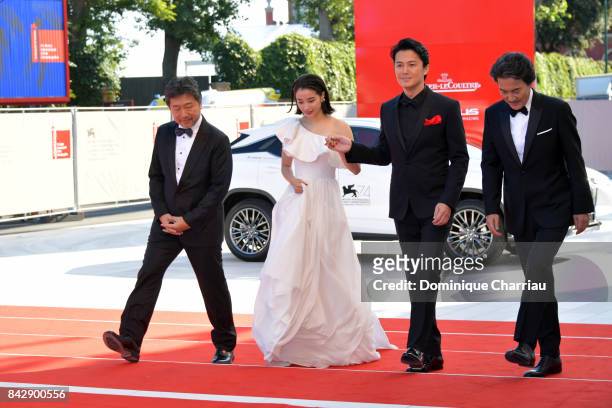 Hirokazu Koreeda, Suzu Hirose, Koji Yakusho , Masaharu Fukuyama and Ludovico Einaudi walk the red carpet ahead of the 'The Third Murder ' screening...