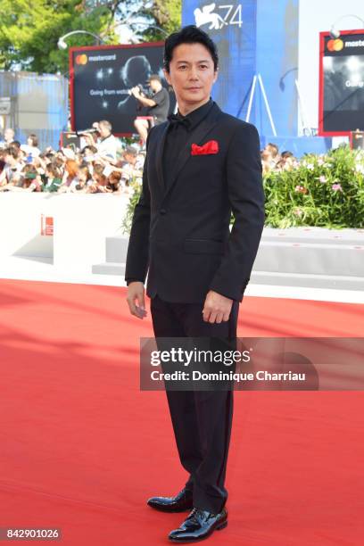 Masaharu Fukuyama walks the red carpet ahead of the 'The Third Murder ' screening during the 74th Venice Film Festival at Sala Grande on September 5,...