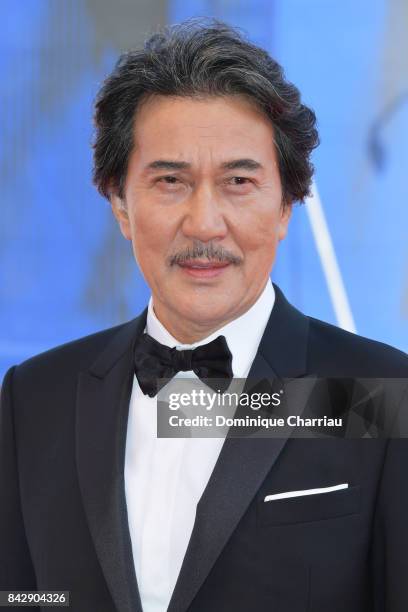 Koji Yakusho walks the red carpet ahead of the 'The Third Murder ' screening during the 74th Venice Film Festival at Sala Grande on September 5, 2017...