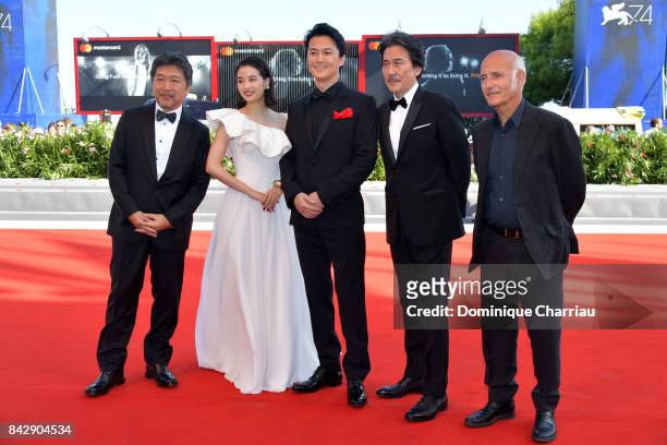 Hirokazu Koreeda, Suzu Hirose, Koji Yakusho, Masaharu Fukuyama and Ludovico Einaudi walk the red carpet ahead of the 'The Third Murder ' screening...