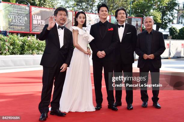 Hirokazu Koreeda, Suzu Hirose, Koji Yakusho, Masaharu Fukuyama and Ludovico Einaudi walk the red carpet ahead of the 'The Third Murder ' screening...