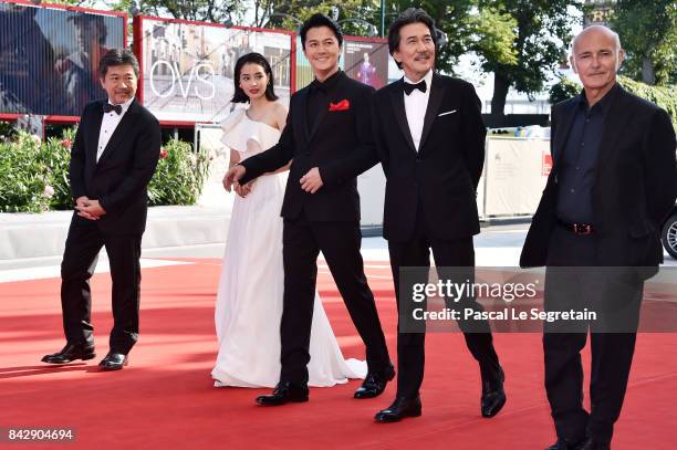 Hirokazu Koreeda, Suzu Hirose, Koji Yakusho, Masaharu Fukuyama and Ludovico Einaudi walk the red carpet ahead of the 'The Third Murder ' screening...